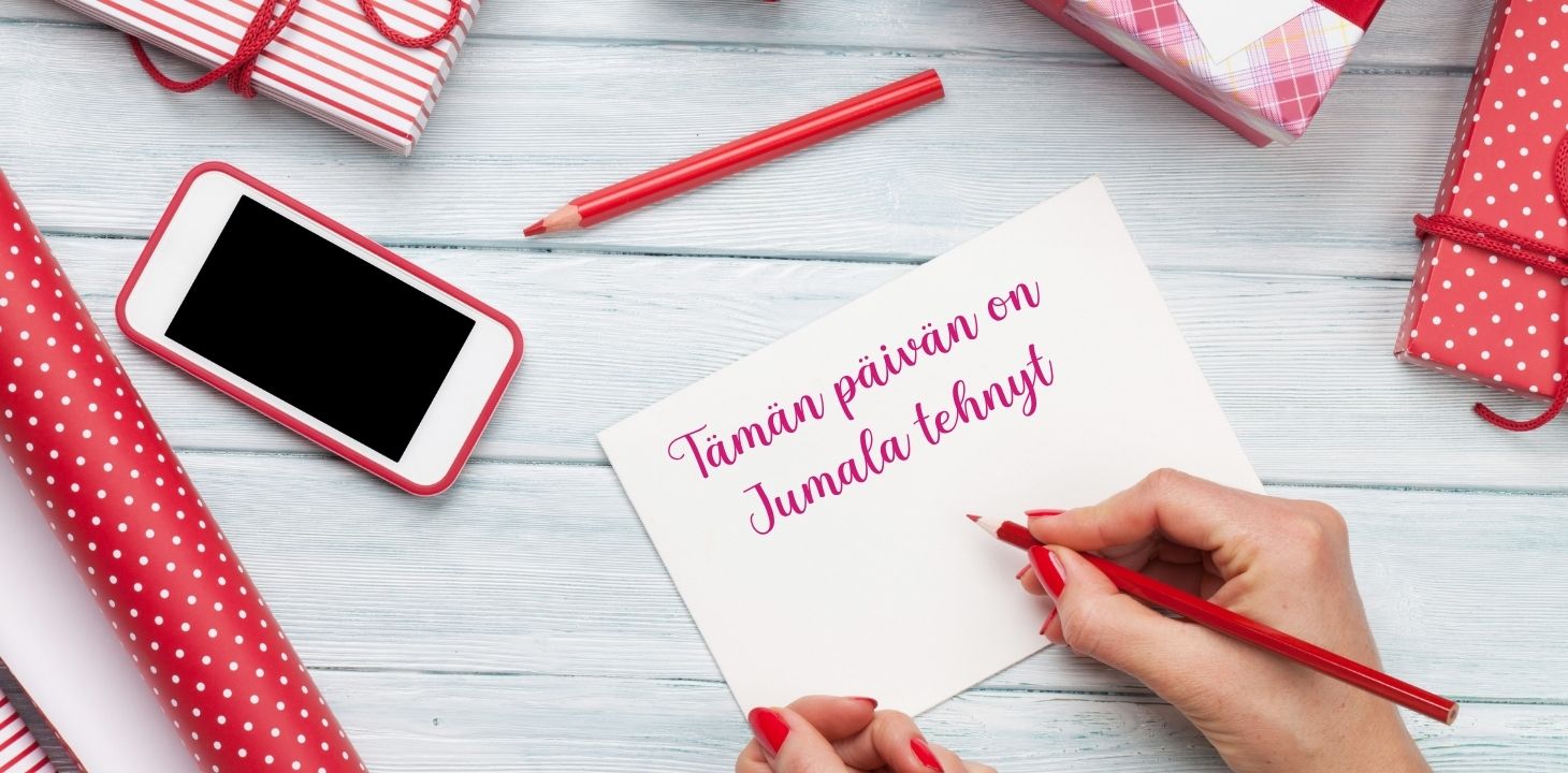 Kädet kirjoittavat korttia, jossa lukee "tämän päivän on Jumala tehnyt"